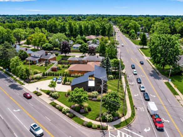 Aerial view of the Cornerhouse modular home and neighborhood
