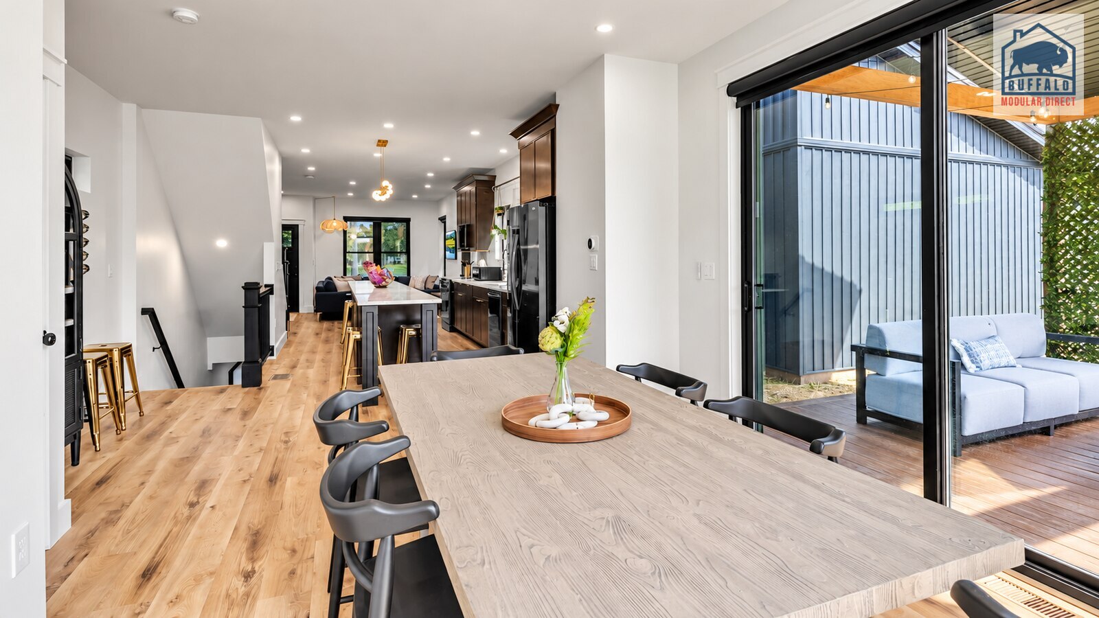 Cornerhouse open-plan kitchen and dining area with patio access