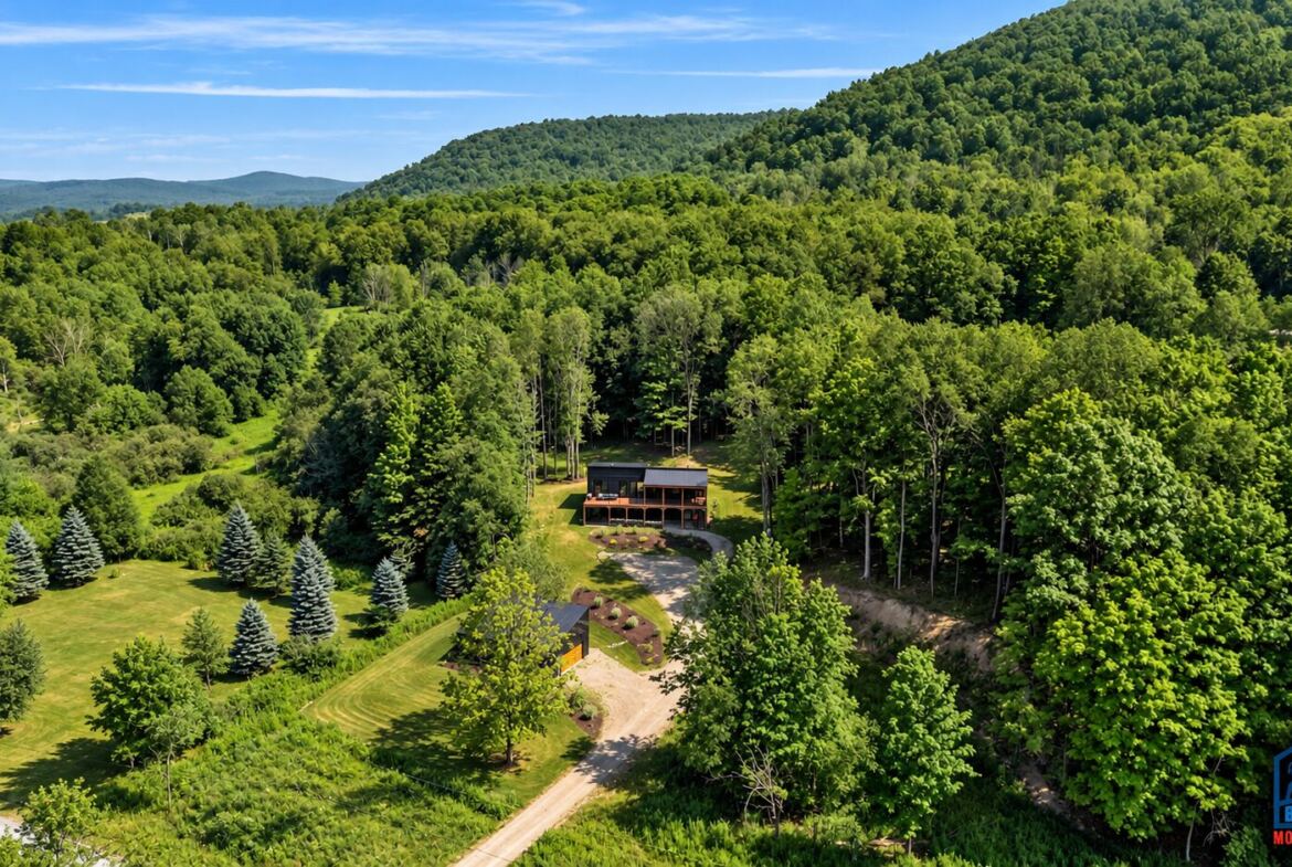 Aerial view of the Modern Maples modular home in the hills of Ellicottville, NY