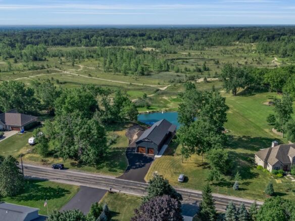 Custom modular barndominium with a grand front porch in Clarence, NY